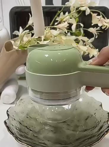 Cargar video: Persona utilizando la picadora de alimentos Mixo Food Chopper para cortar verduras y carne de forma rápida y segura en la cocina